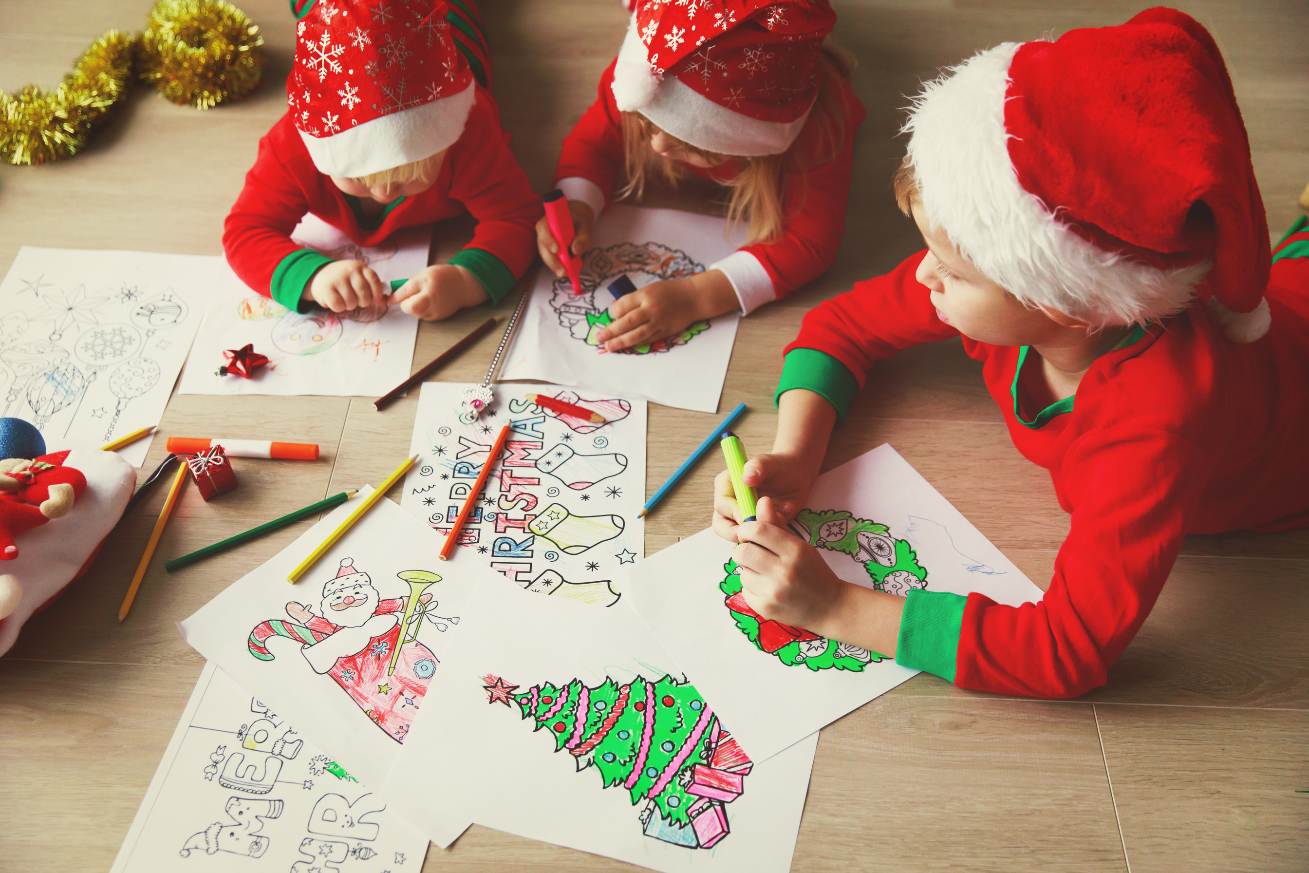 kids making Christmas crafts, family celebration